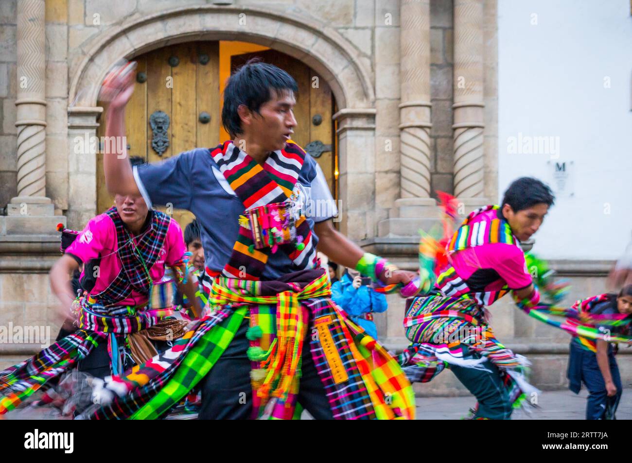 Sucre, Bolivia on September 5, 2015: Bolivian dancers in colorful costumes at Fiesta de la Virgen de Guadalupe in Sucre in front of Cathedral gate Stock Photo