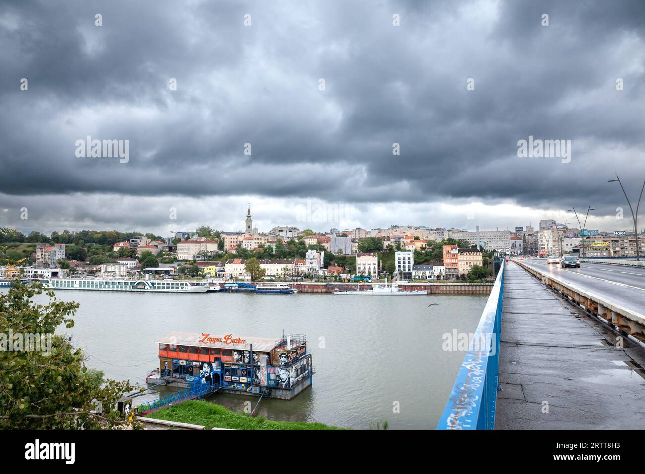 Picture of Sava river in Belgrade, capital city of Serbia, with Brankov most bridge crossing the river and the iconic district of stari grad old town. Stock Photo