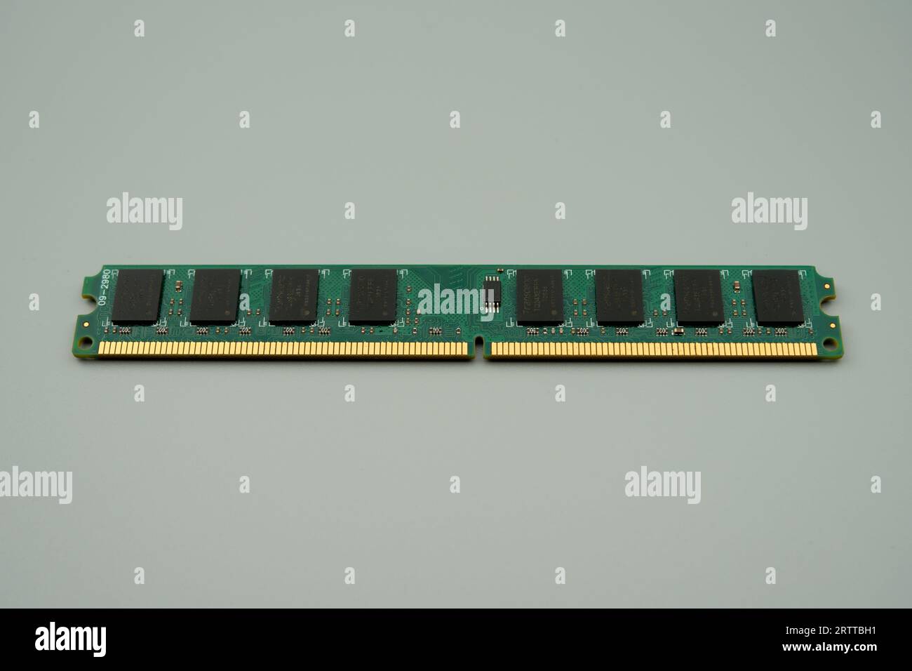 LP-type DDR2 memory on a green PCB, gray background Stock Photo