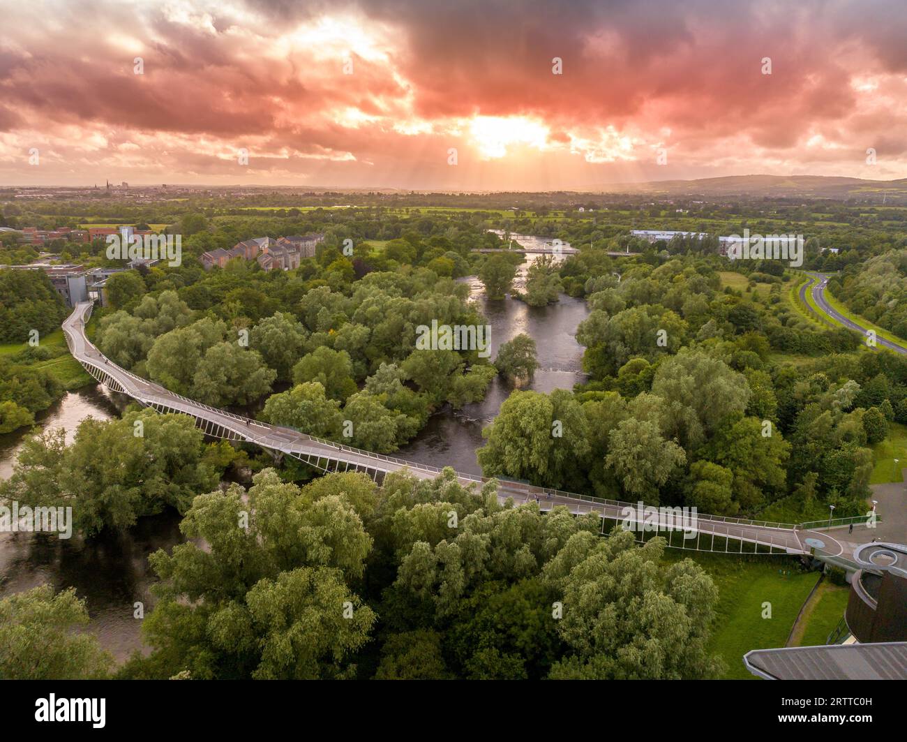 Aerial panoramic view of Living Bridge, curving modern pedestrian