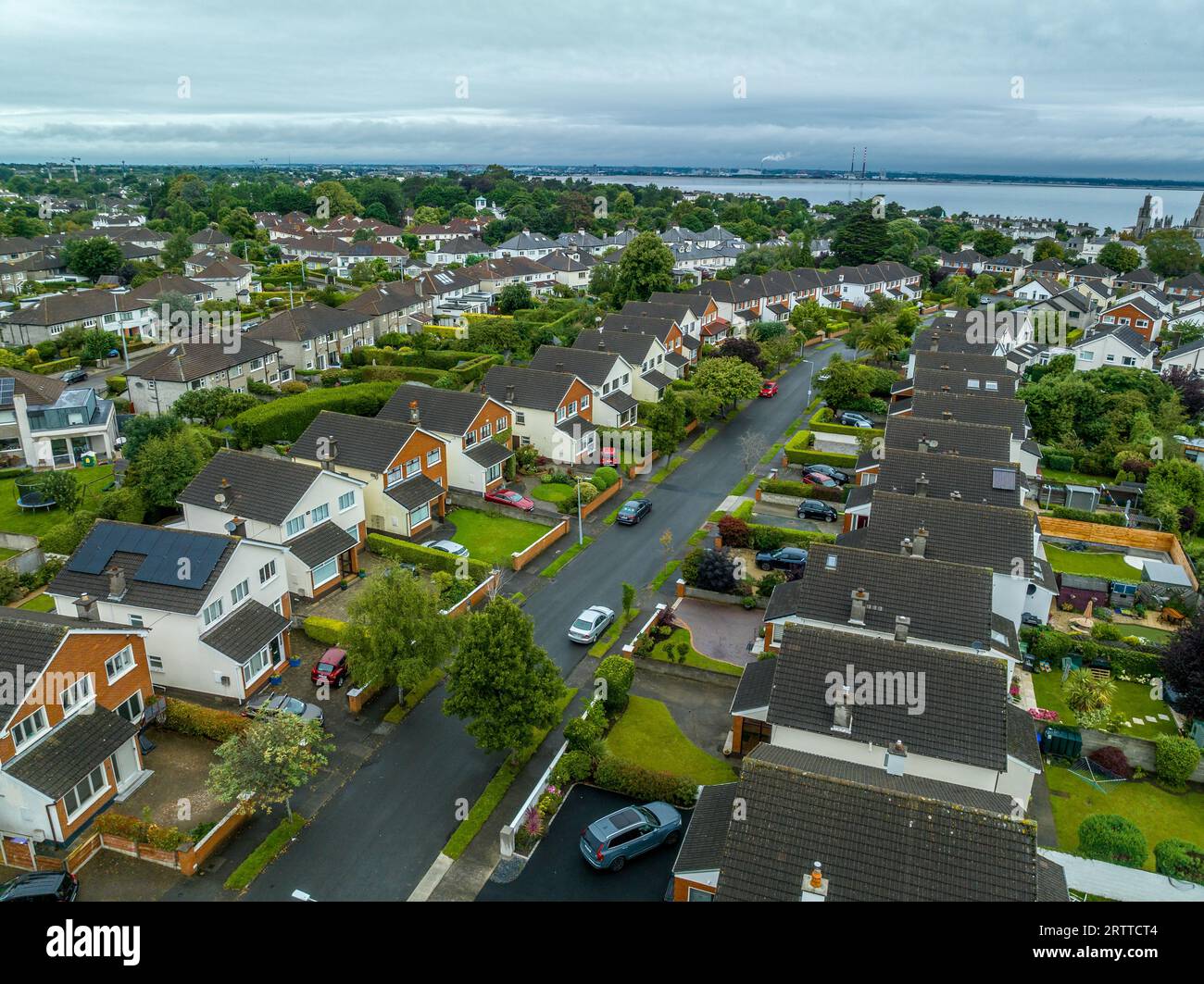 Aerial view of upper middle class Irish neighborhood with single family