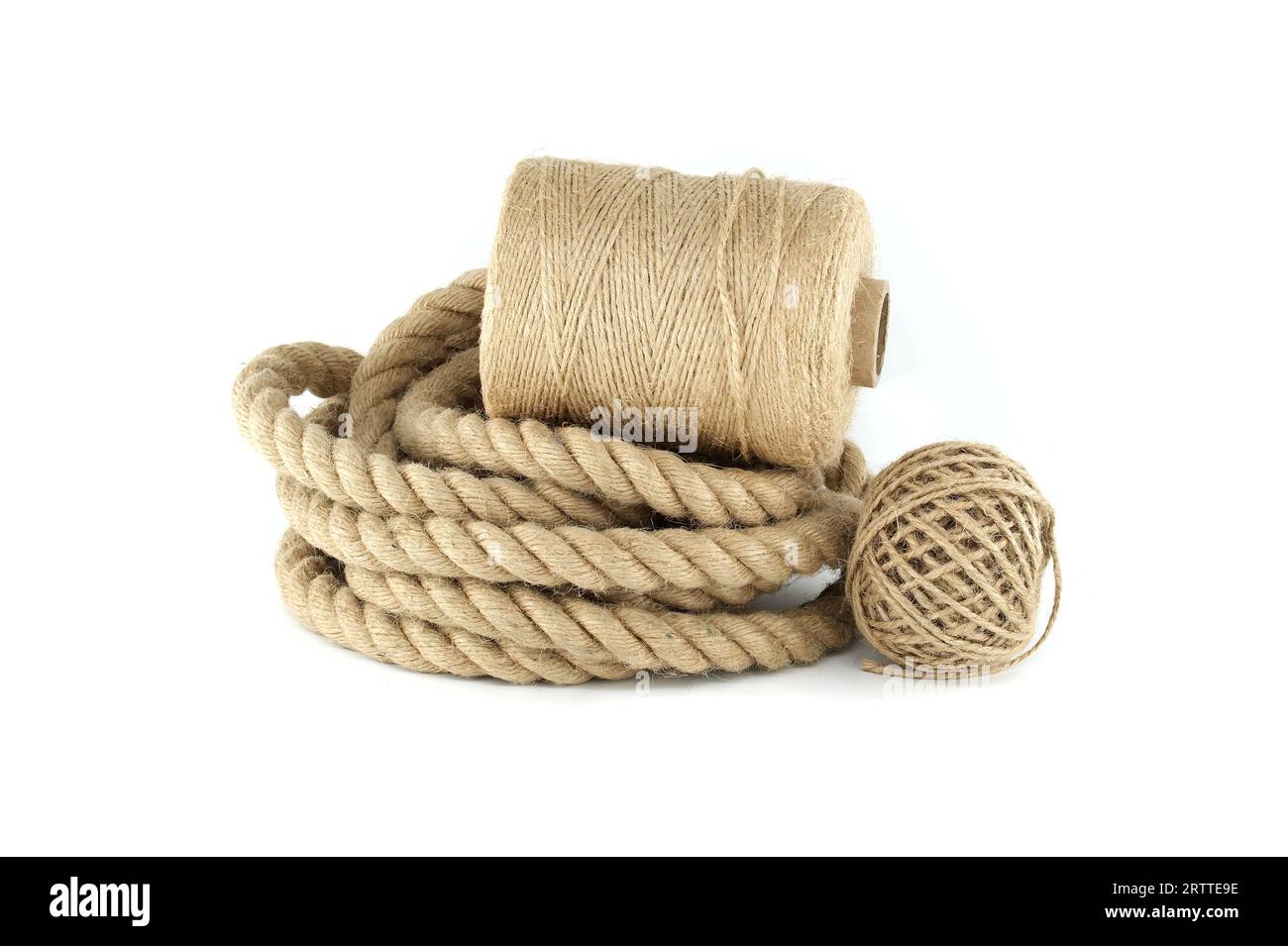 A closeup view of coiled jute rope and brown twisted jute twine