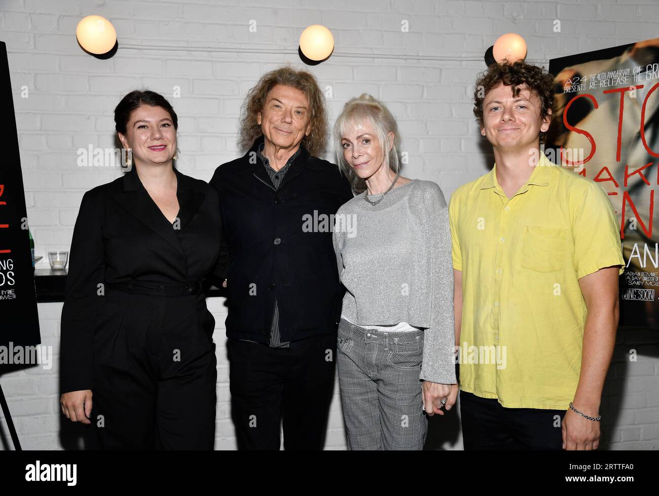 Musician Jerry Harrison, second from left, poses with family members at ...