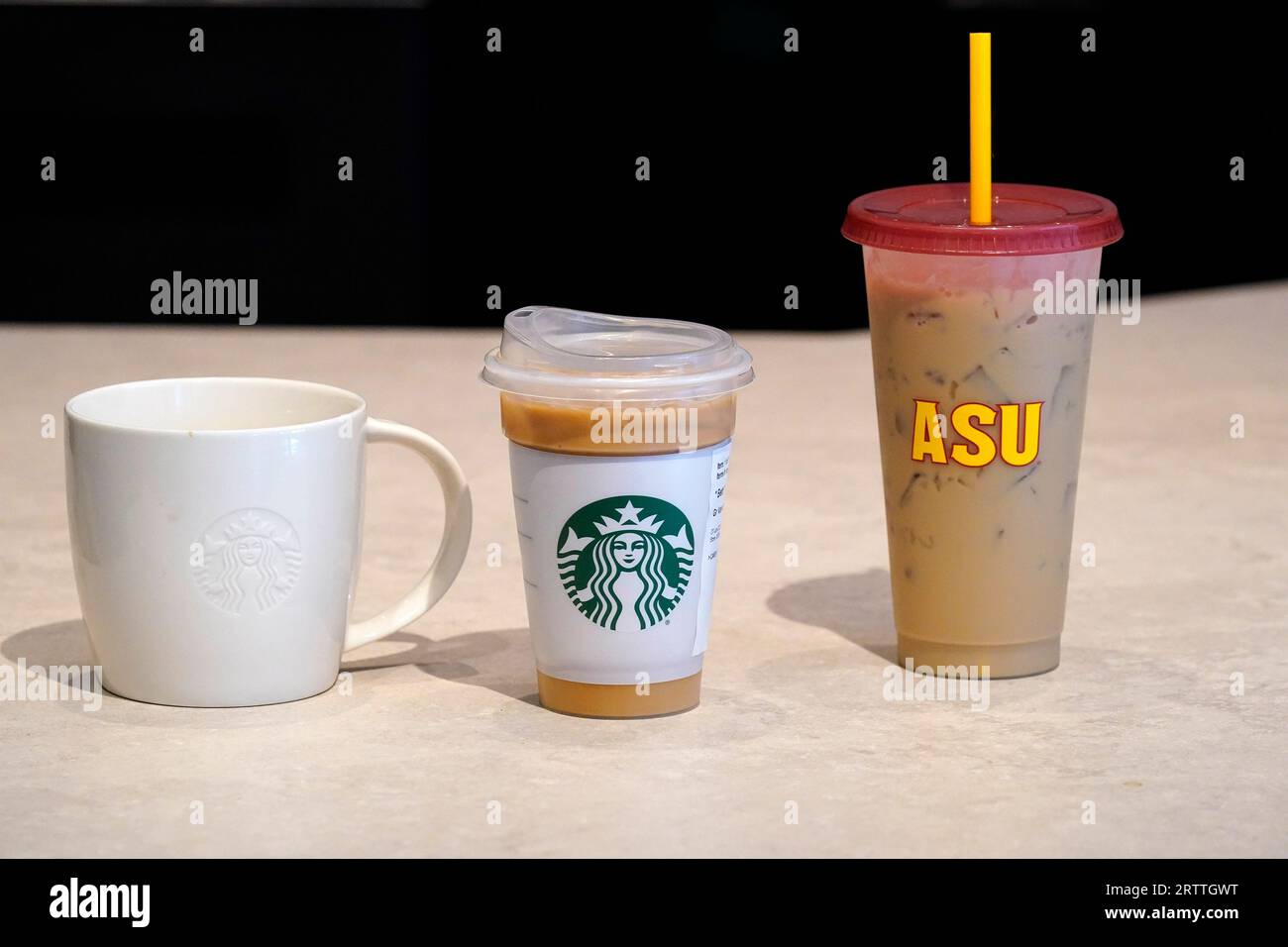 Different kind of reusable cups are displayed at an Arizona State  University Starbucks shop Wednesday, June 7, 2023, in Tempe, Ariz. At the  Arizona State store, if customers don't bring their own
