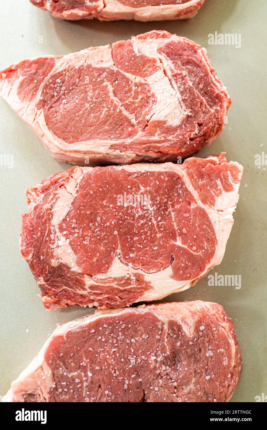 Seasoned Rib Eye Steak Ready for Grilling Stock Photo Alamy