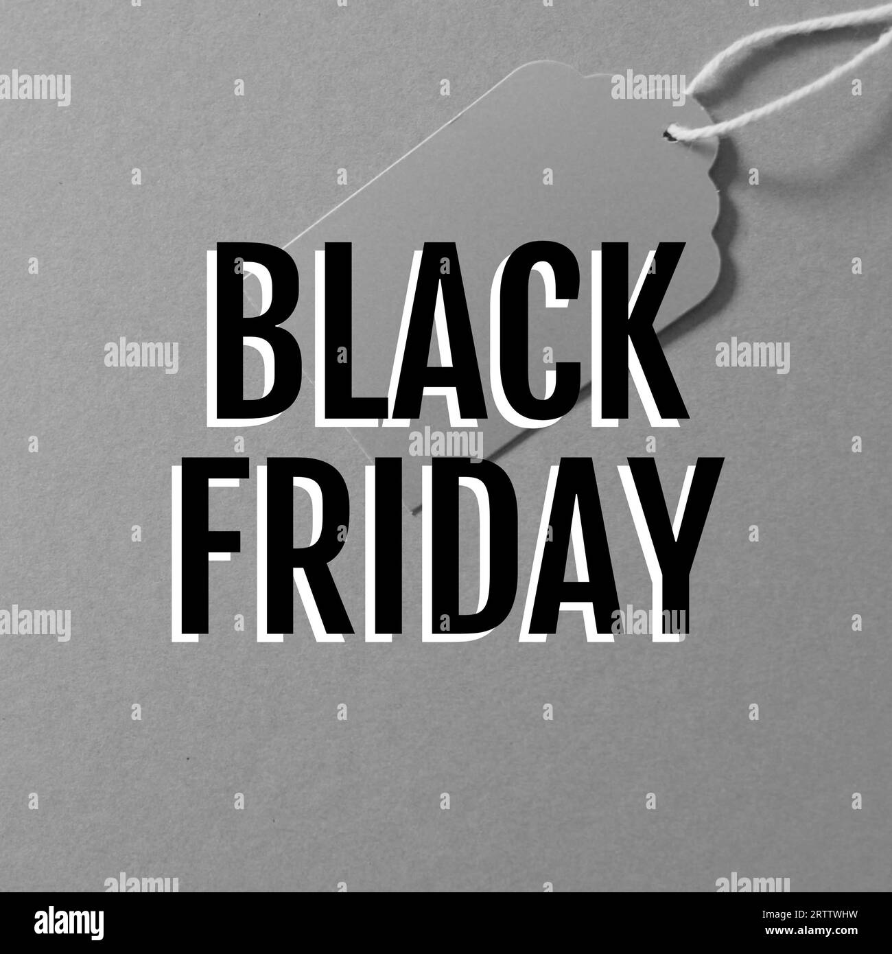 Composite of black friday text over grey tag and grey background Stock Photo