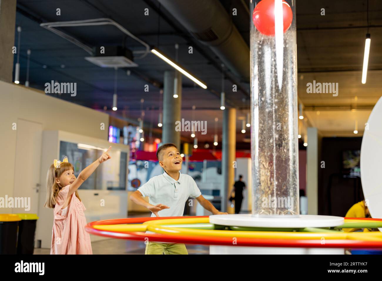 Little boy and girl visit a science museum Stock Photo