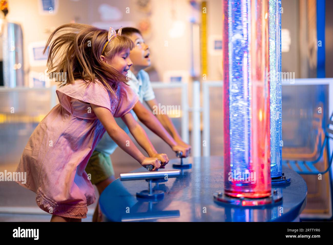 Kids playing in science museum Stock Photo - Alamy