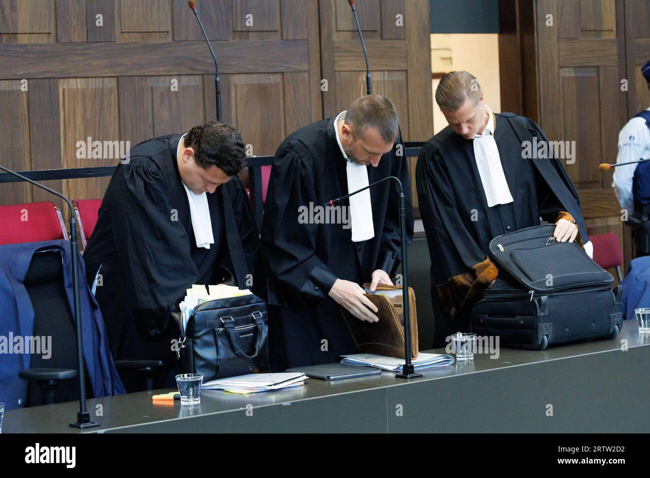 Brugge, Belgium. 15th Sep, 2023. Lawyer Gregory Everaert, Lawyer Maarten Vandermeersch and Lawyer Robbie Dewaele pictured during the first session in the trial concerning the robbery and murder of Roland Roelens, before the Assizes Court of West-Flanders, in Brugge, Friday 15 September 2023. Roland Roelens (66) had his throat slit in October 2016, but the suspected perpetrator, his neighbour Nico Torck, has died. The neighbour's wife, their daughter and an acquaintance still have to answer for their part in the facts. BELGA PHOTO KURT DESPLENTER Credit: Belga News Agency/Alamy Live News Stock Photo