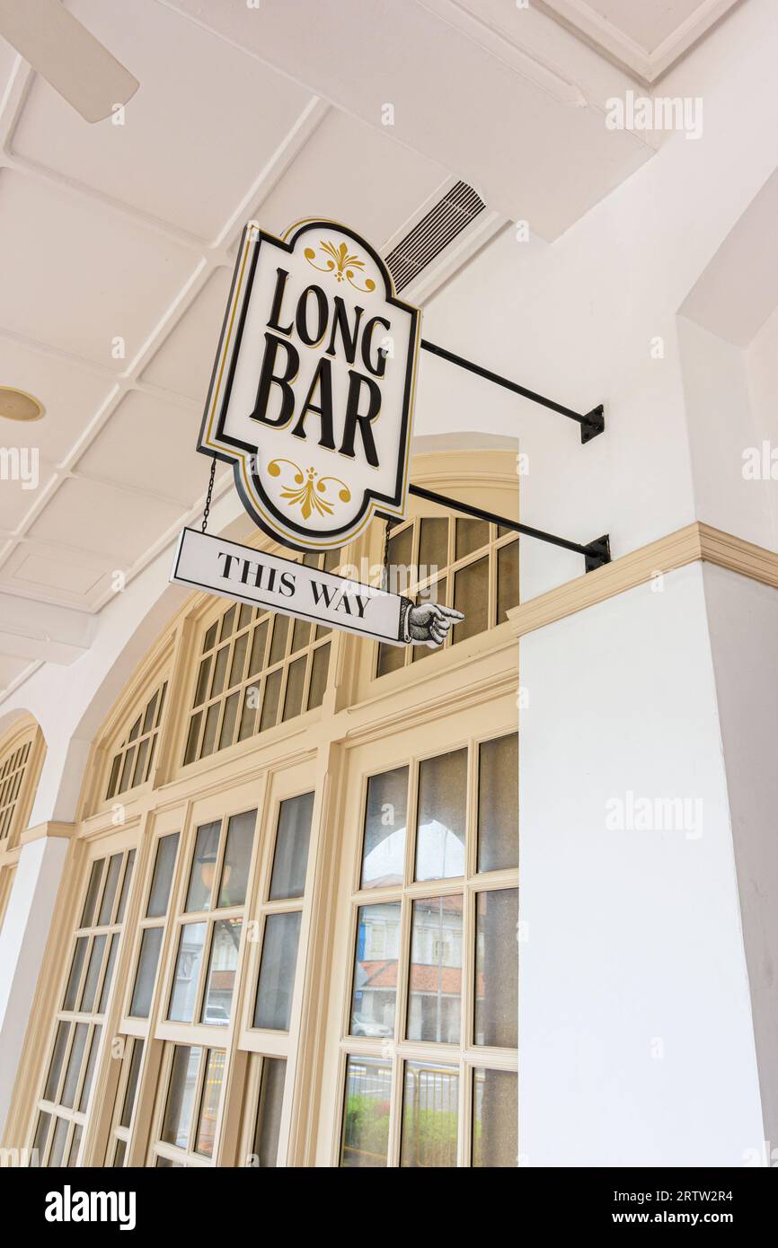 The Long Bar sign outside the historic Raffles Hotel, Singapore Stock Photo