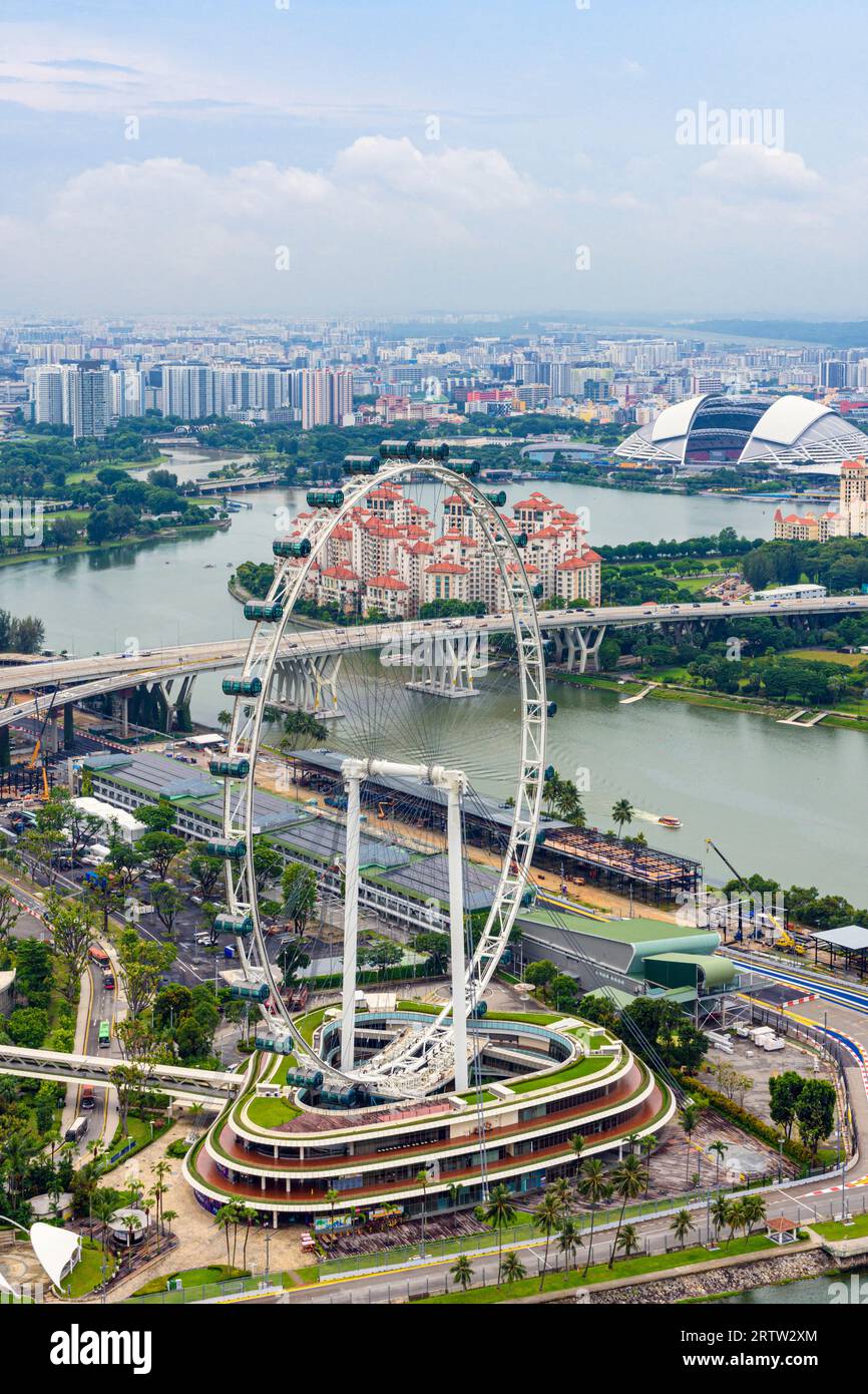 Looking north east across Singapore through the Singapore Flyer large Ferris wheel Stock Photo