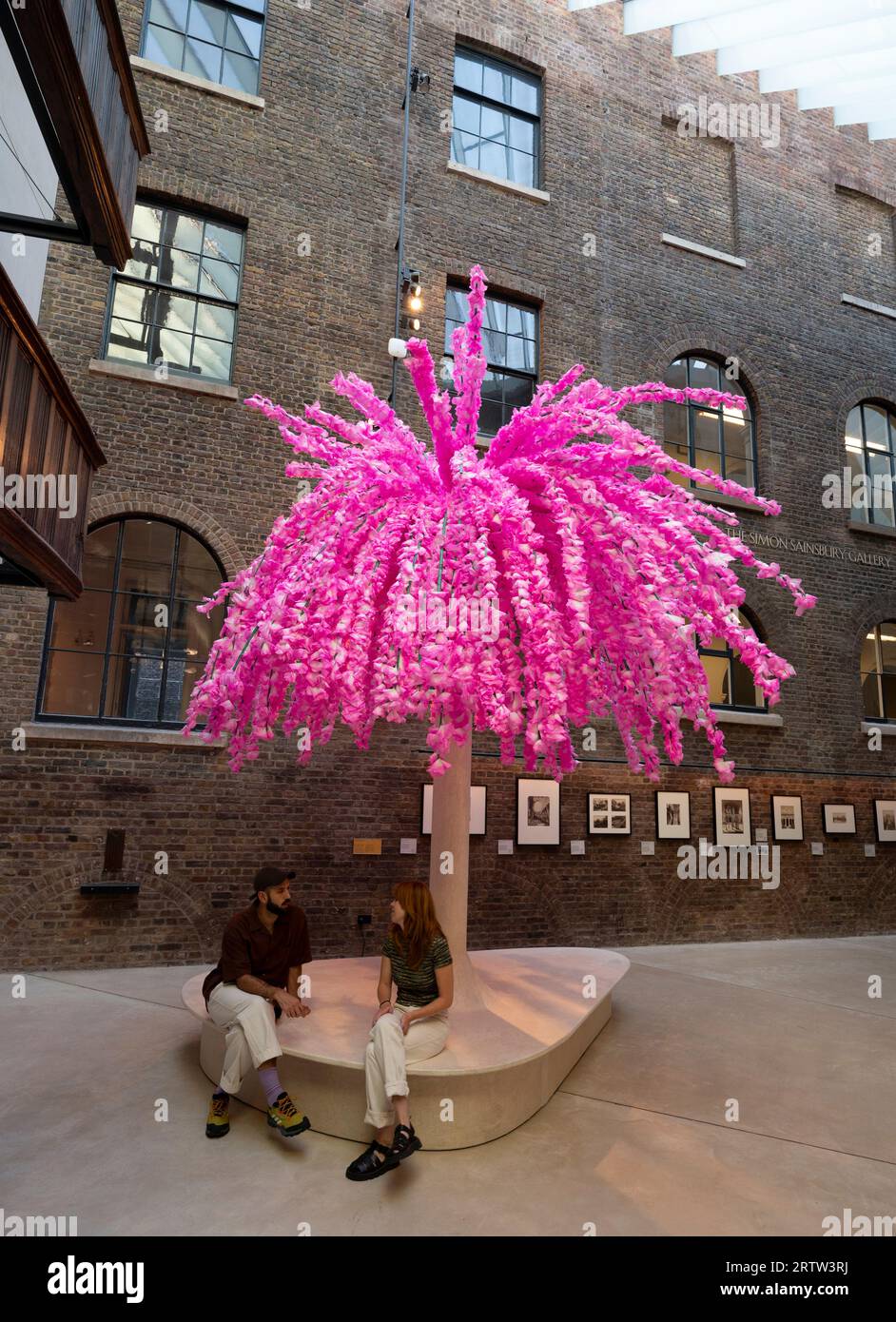 V&A, London, UK. 15th Sep, 2023. For London Design Festival 2023 the V&A have commissioned 5 installations by international contemporary designers which celebrate the global power of design to bind communities. Image: “Hana Mikoshi” A 5-Metre-tall seating installation, covered with 50,000 cherry blossom flowers made of Japanese Washi paper. The Washi Paper was handcrafted by craftspeople in Japan and applied to the structure by V&A visitors throughout summer. The installation is inspired by the Mino Matsuri festival in Japan. Credit: Malcolm Park/Alamy Live News Stock Photo