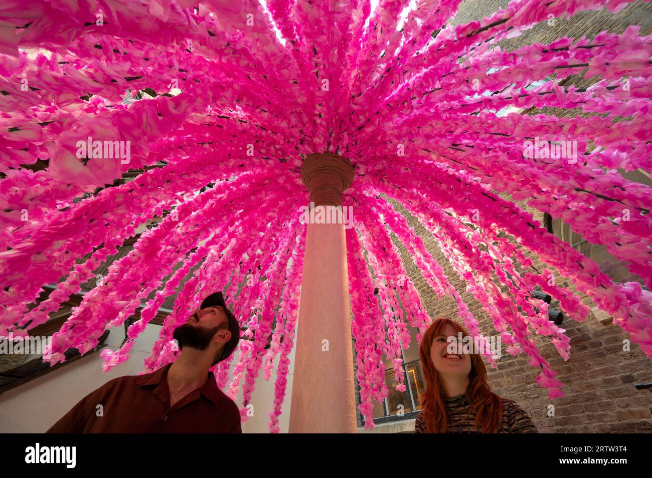 V&A, London, UK. 15th Sep, 2023. For London Design Festival 2023 the V&A have commissioned 5 installations by international contemporary designers which celebrate the global power of design to bind communities. Image: “Hana Mikoshi” A 5-Metre-tall seating installation, covered with 50,000 cherry blossom flowers made of Japanese Washi paper. The Washi Paper was handcrafted by craftspeople in Japan and applied to the structure by V&A visitors throughout summer. The installation is inspired by the Mino Matsuri festival in Japan. Credit: Malcolm Park/Alamy Live News Stock Photo