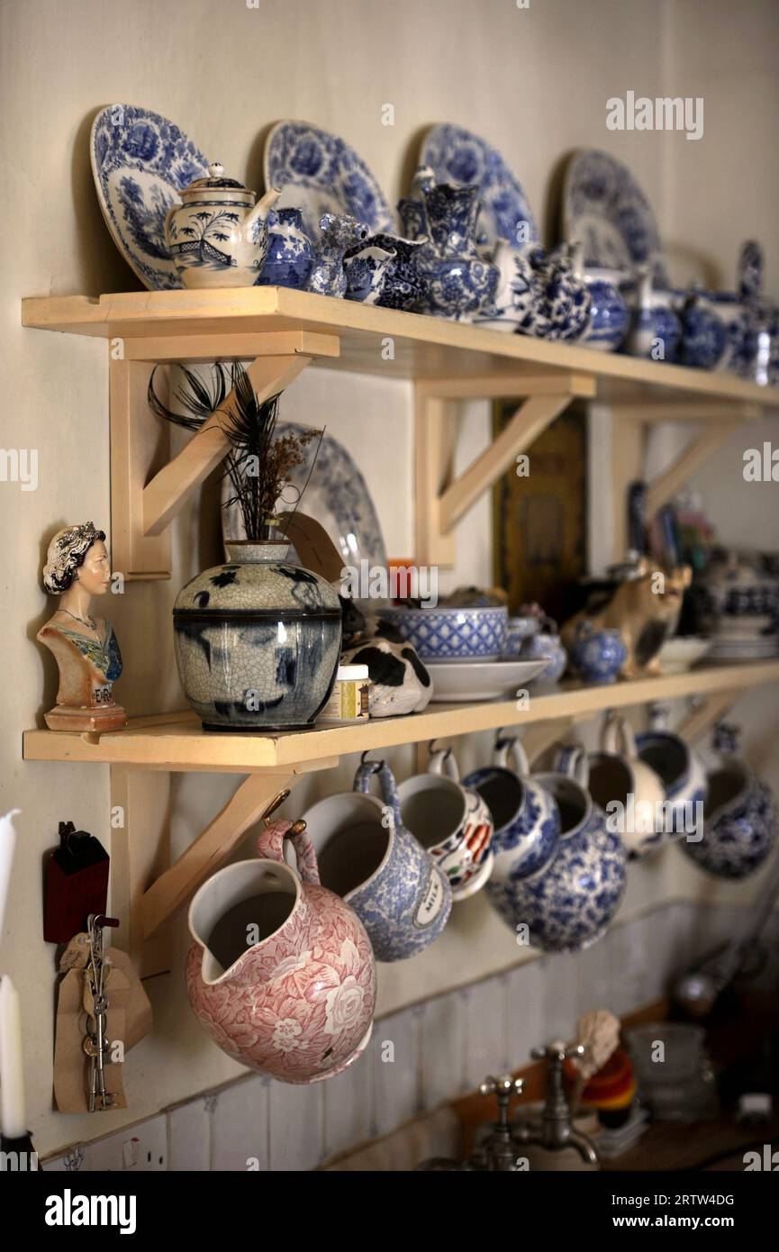 Collection of mainly blue & white china in a country kitchen, UK. Stock Photo