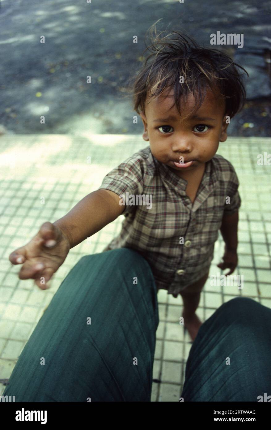 Begging boy in Mumbai (Bombay) Stock Photo