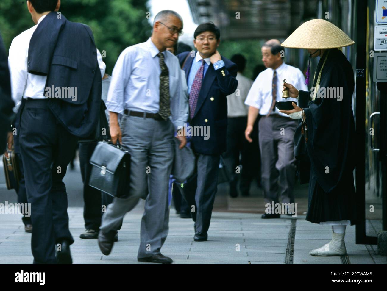 Mendicant friar in Ginza, Tokyo Stock Photo