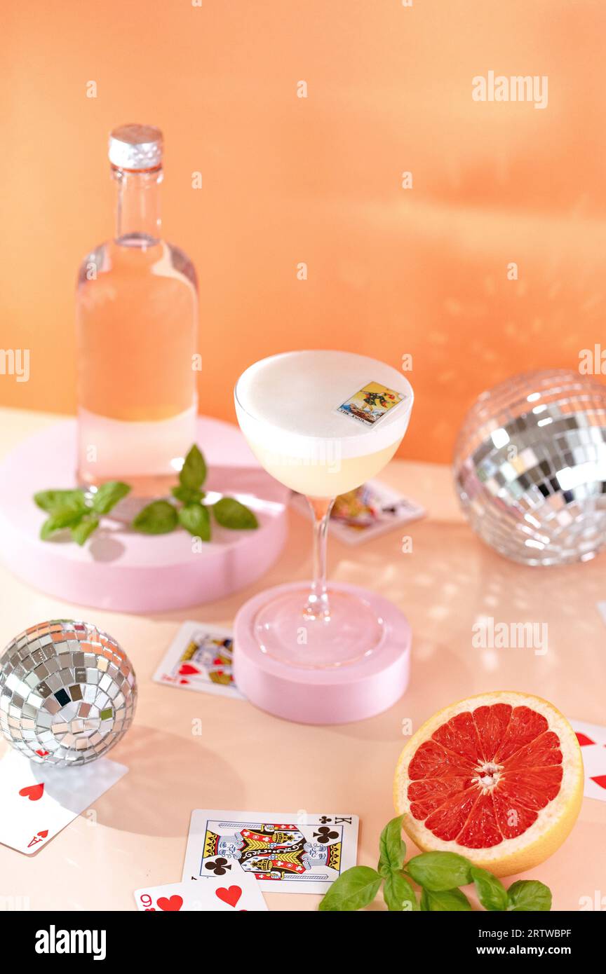 Cocktail, a sour drink with Gin, and egg white foam Stock Photo Alamy