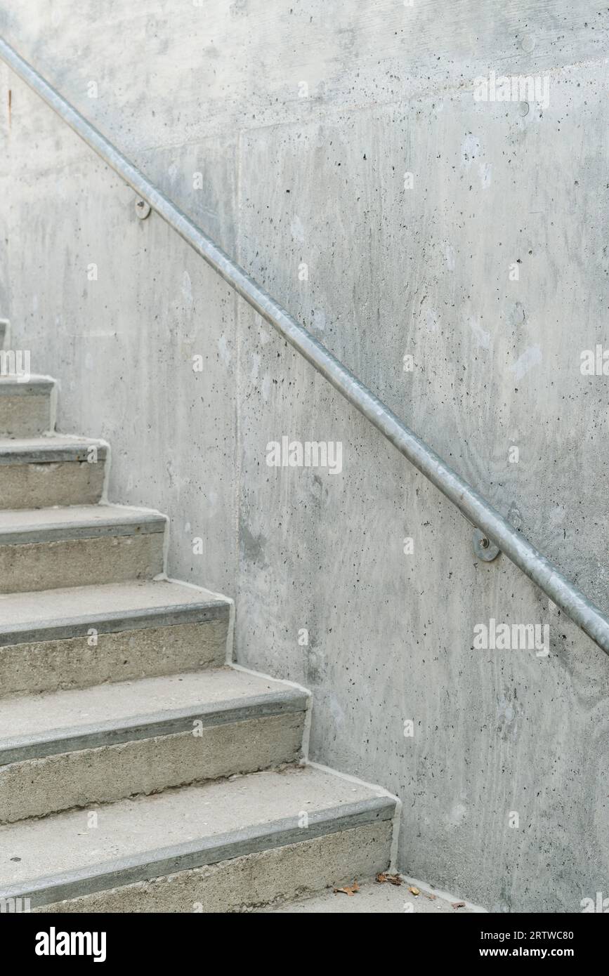 A minimalist grey cement staircase Stock Photo - Alamy