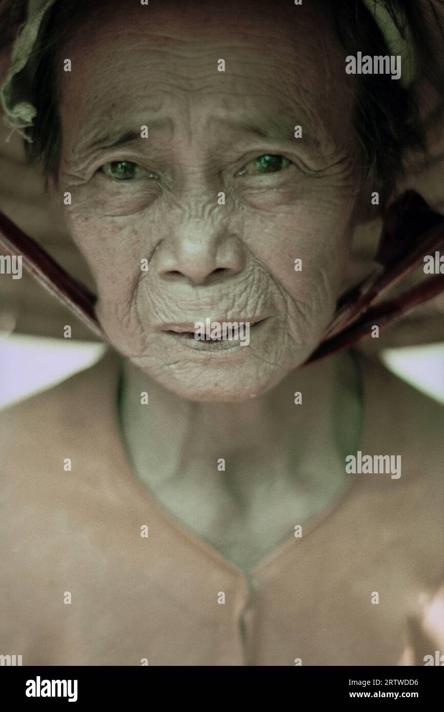 Portrait of a traditional Vietnamese elderly lady Stock Photo