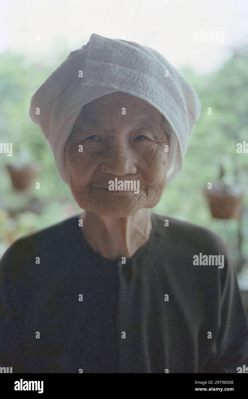 Portrait of an elderly Vietnamese lady Stock Photo
