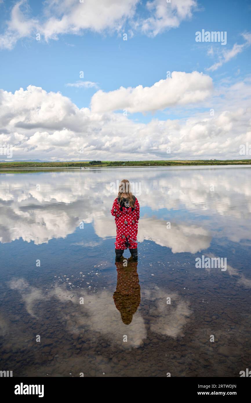 Anonymous child in blue hi-res stock photography and images - Alamy