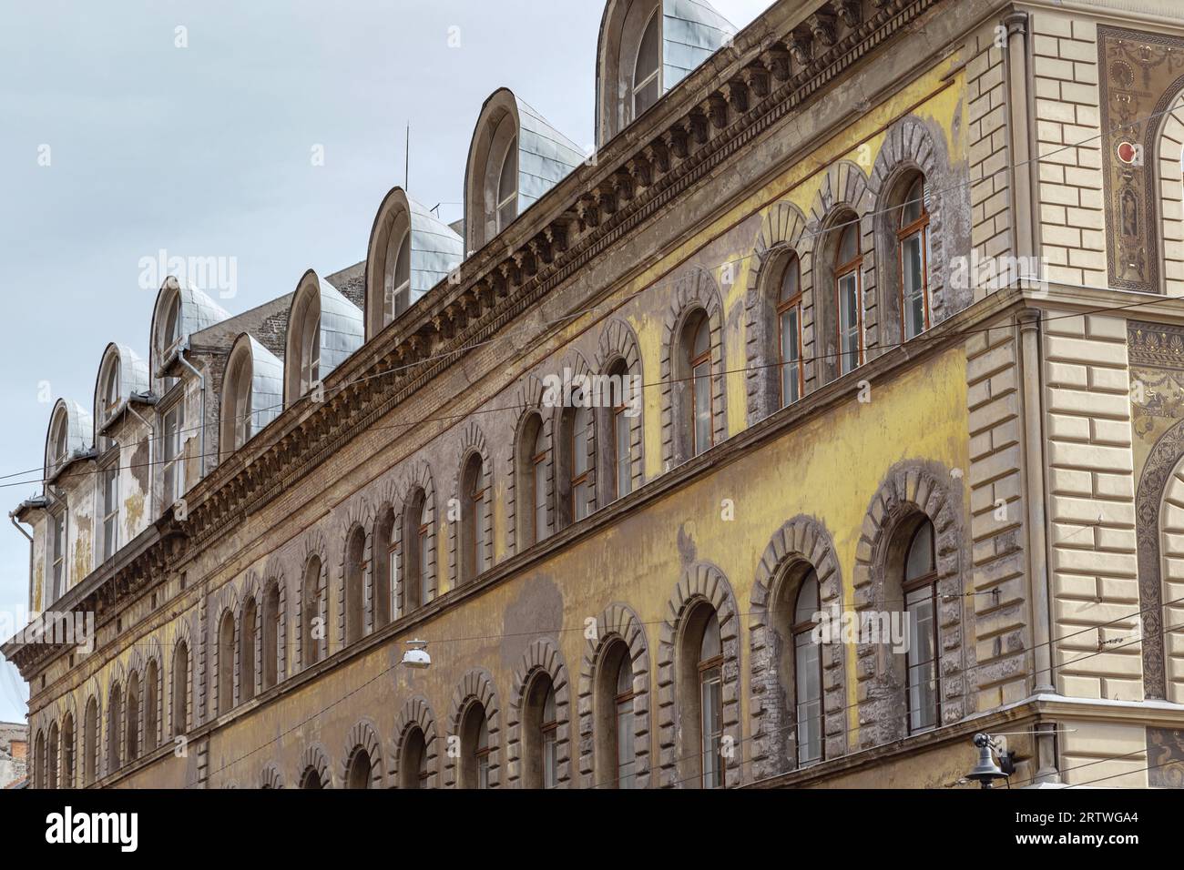 BUDAPEST, HUNGARY - MARTH 13, 2023: This is an architectural fragment with attic windows on the building of the Hungarian University of Fine Arts on A Stock Photo