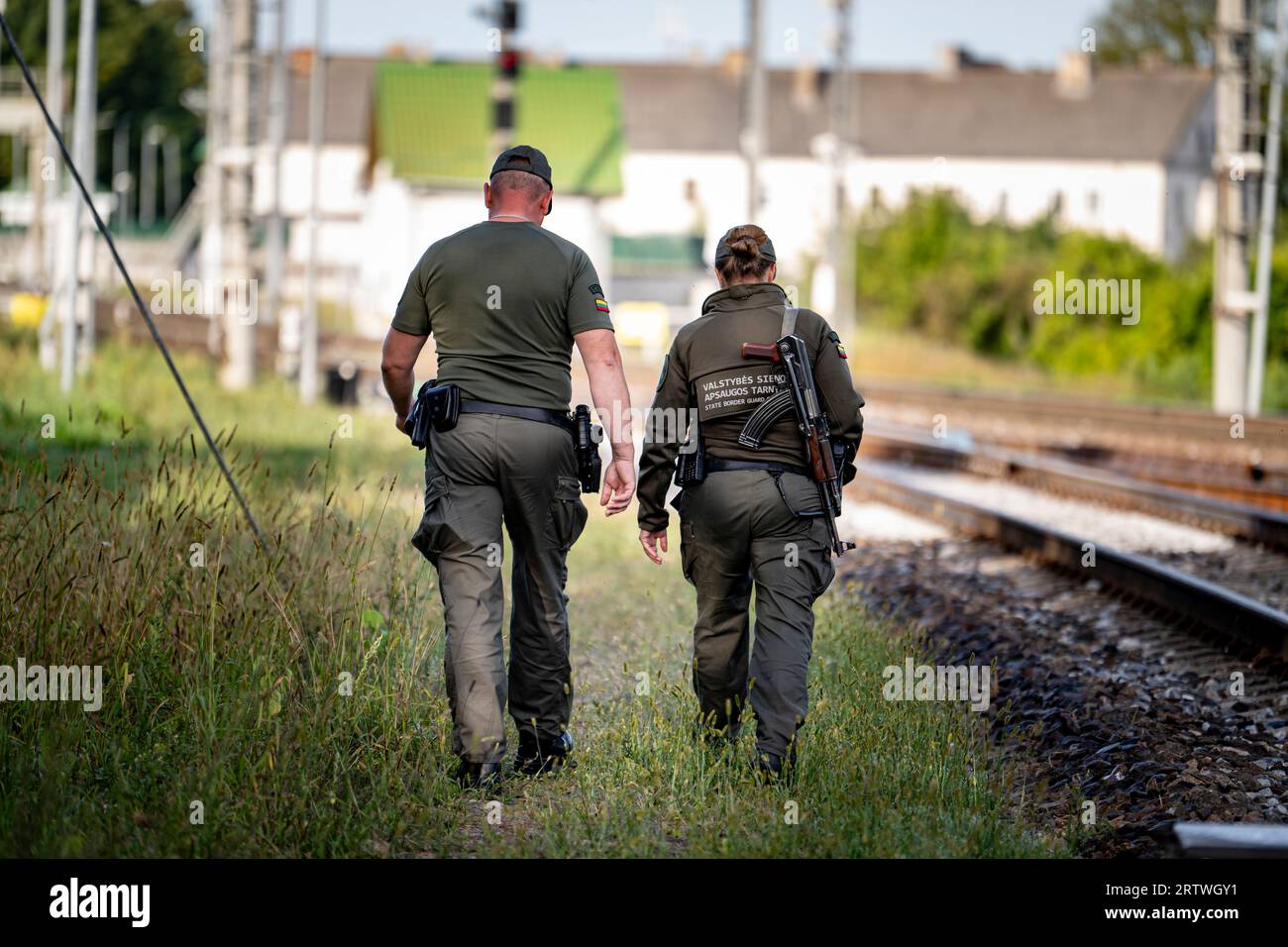 08 September 2023, Lithuania, Kybartai: Two Lithuanian border guards patrol the border area between Russia and Lithuania. The border area between Poland and Lithuania is considered a potential flashpoint in the event of a confrontation between Russia and NATO. Poland is arming, Lithuania is to get a Bundeswehr brigade.      (to dpa 'Suwalki gap: Nato's weak spot makes Poland and Lithuania nervous') Photo: Fabian Sommer/dpa Stock Photo