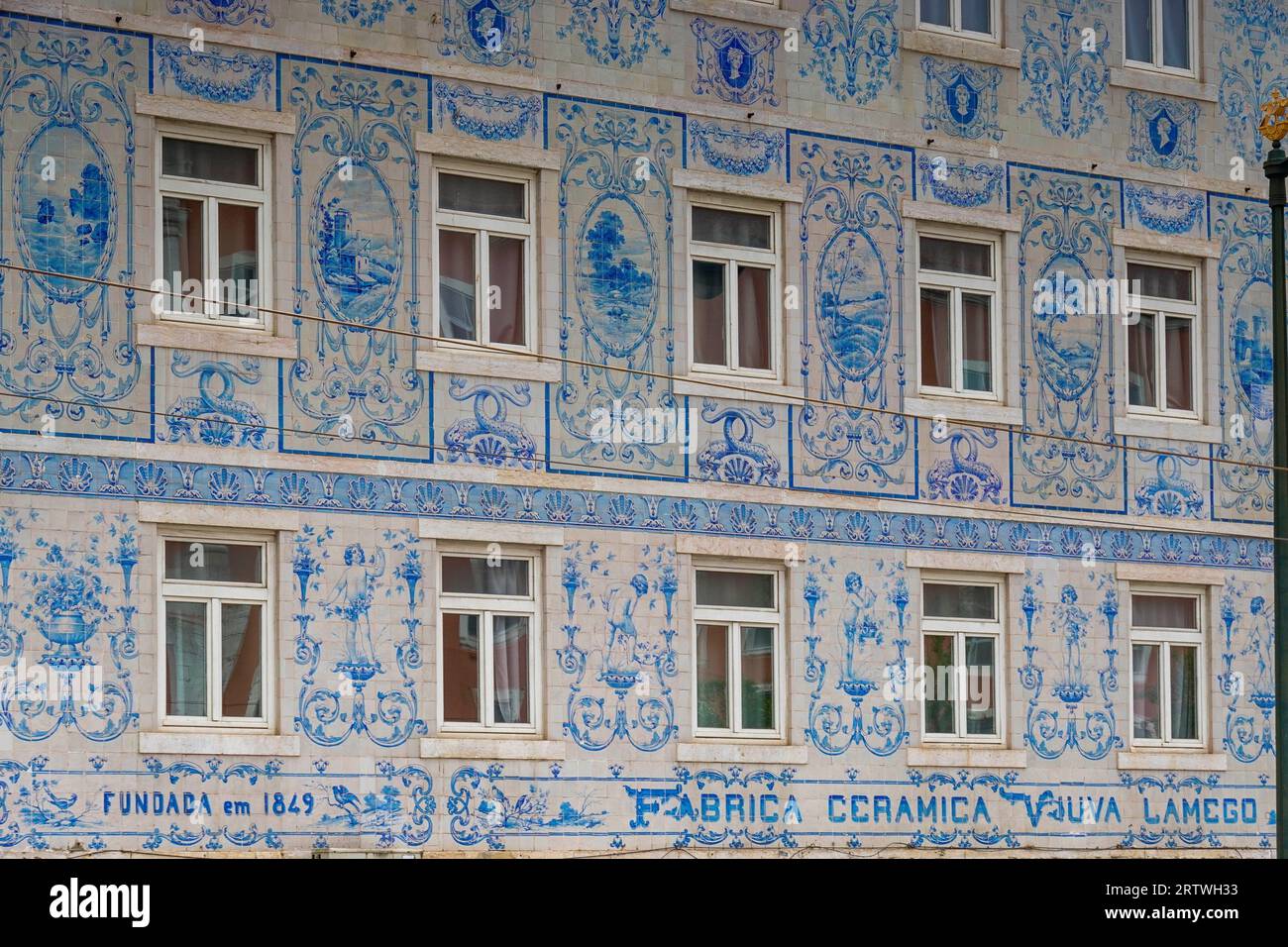 Portugal, Lisbon, Tile artwork on the facade of the former Viuva Lamego