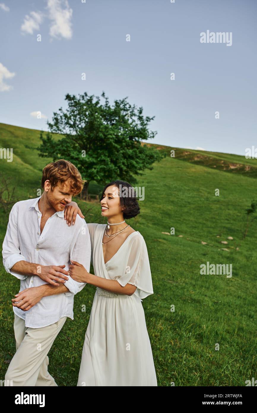 Happy asian couple walking together hi-res stock photography and images ...