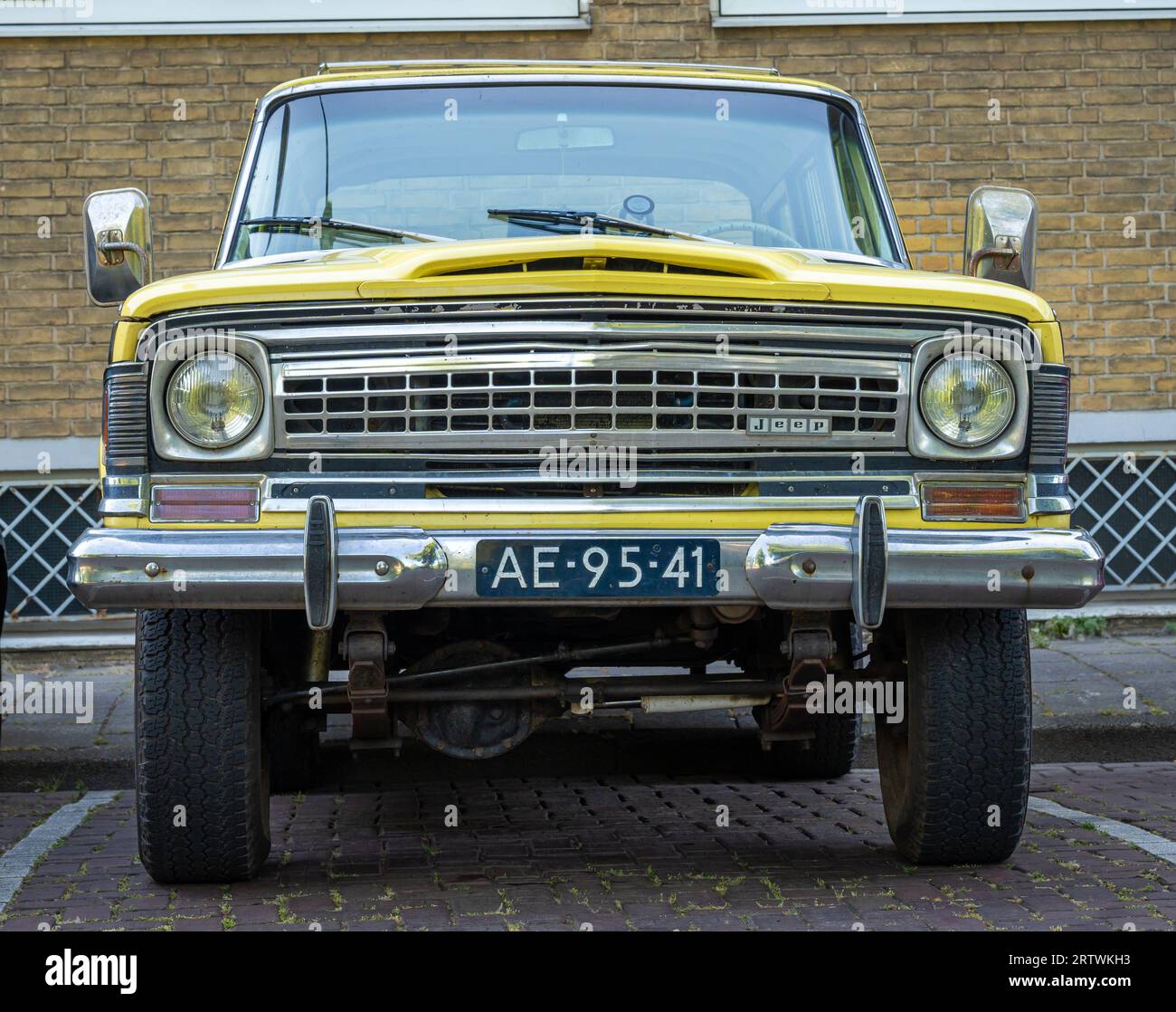 Amsterdam, The Netherlands, 16.06.2023, Front view of retro full-size SUV Jeep Wagoneer from 1972 Stock Photo