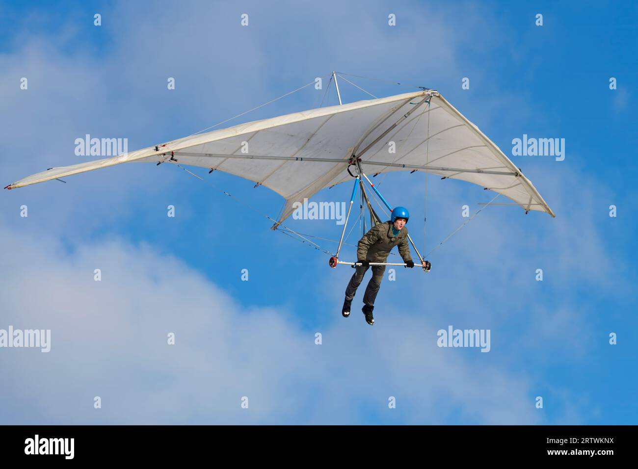 Pilot learning to fly on vintage rogallo hangglider wing Stock Photo