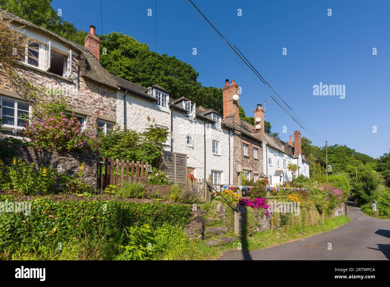 Terraced cottages in the coastal settlement of Porlock Weir in the Exmoor National Park, Somerset, England. Stock Photo