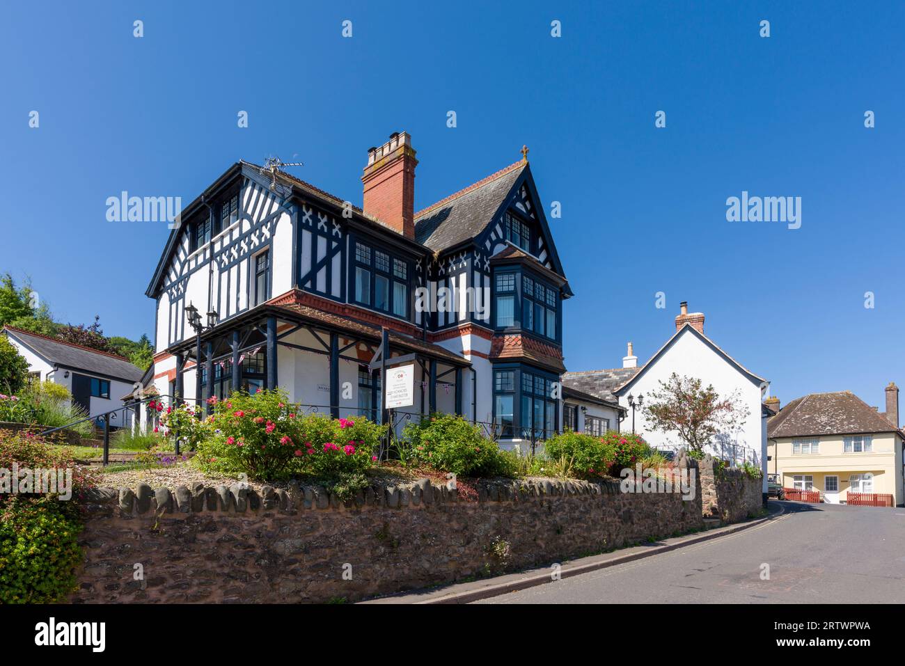 A bed and breakfast establishment on the High Street in the village of Porlock, Exmoor National Park, Somerset, England. Stock Photo