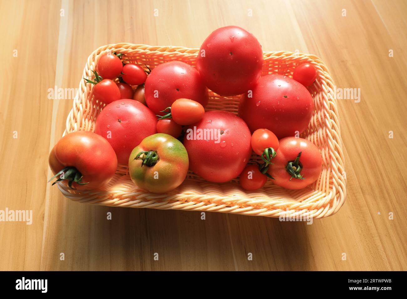 The tomatoes are on the chopping board Stock Photo - Alamy