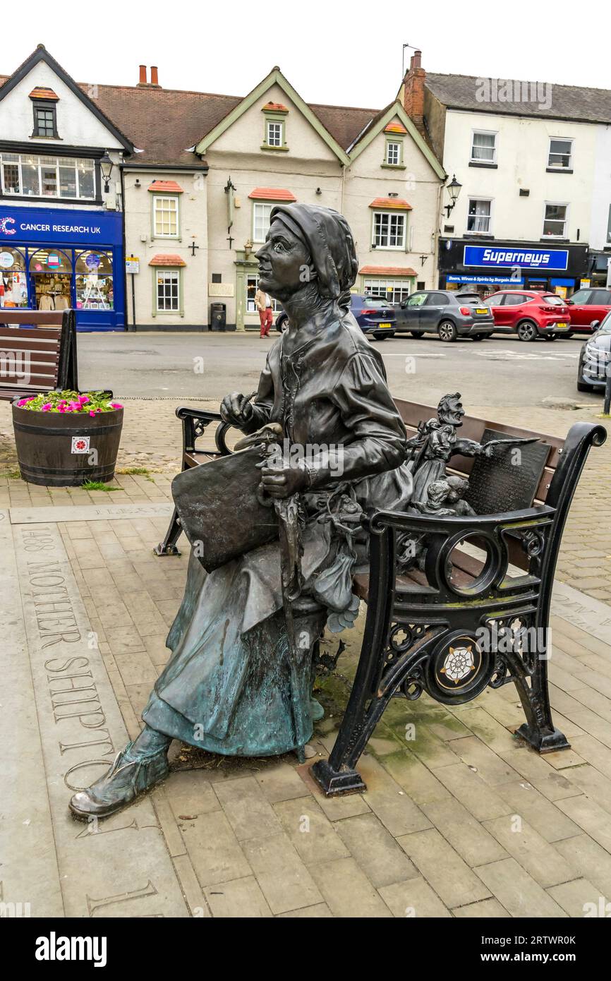 Seated statue of Mother Shipton in Knaresborough market place, Knaresborough, North Yorkshire, England, UK Stock Photo