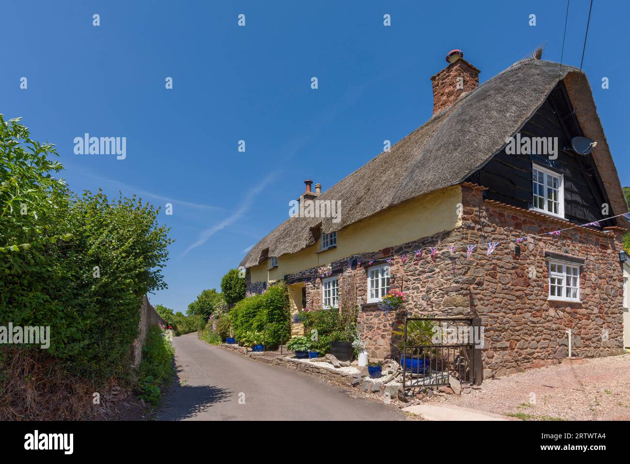 A thatched cottage at Higher Allerford in the Exmoor National Park, Somerset, England. Stock Photo