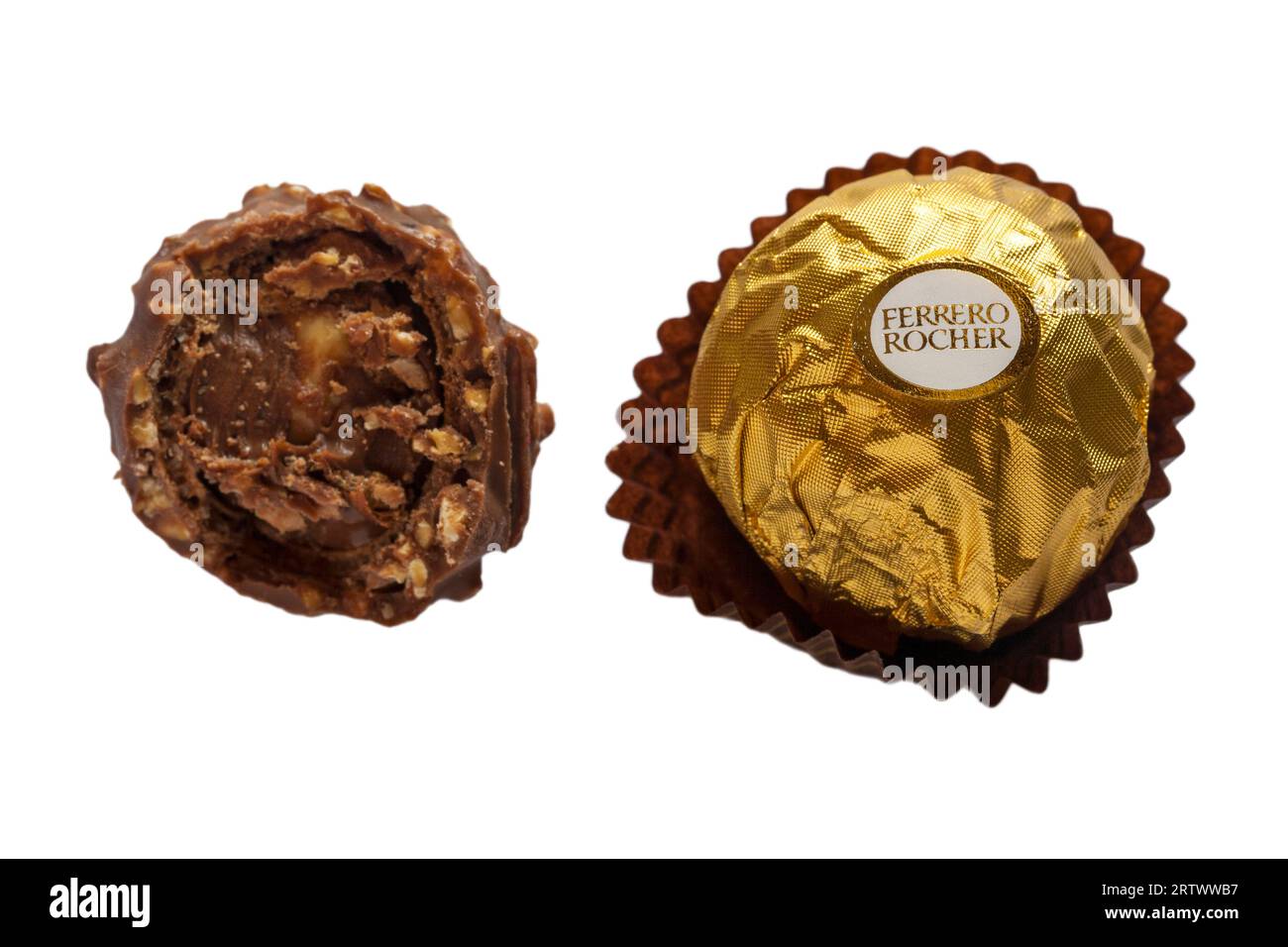 Ferrero Rocher chocolates, one wrapped one unwrapped and bitten into