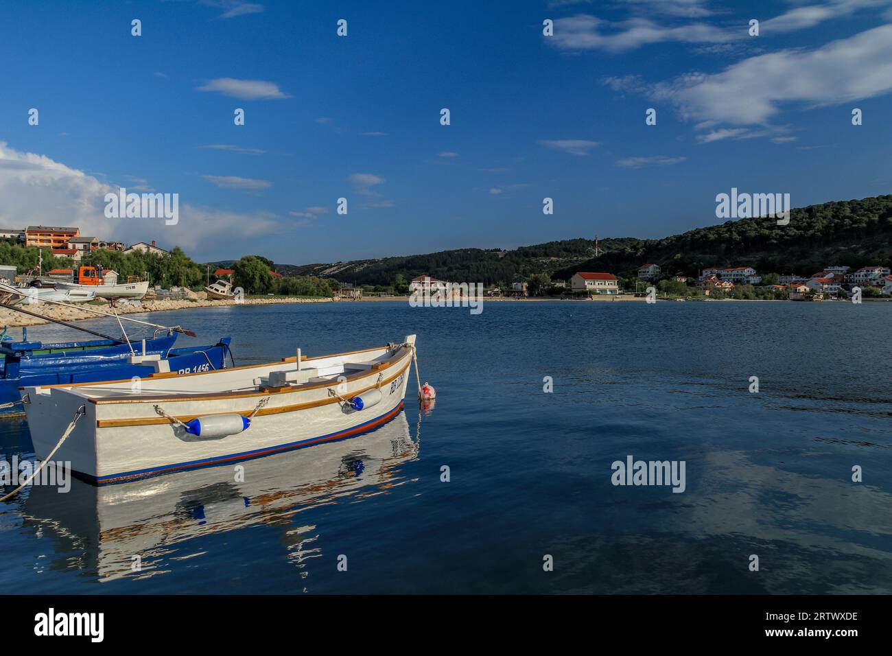 Empty boat in water hi-res stock photography and images - Alamy