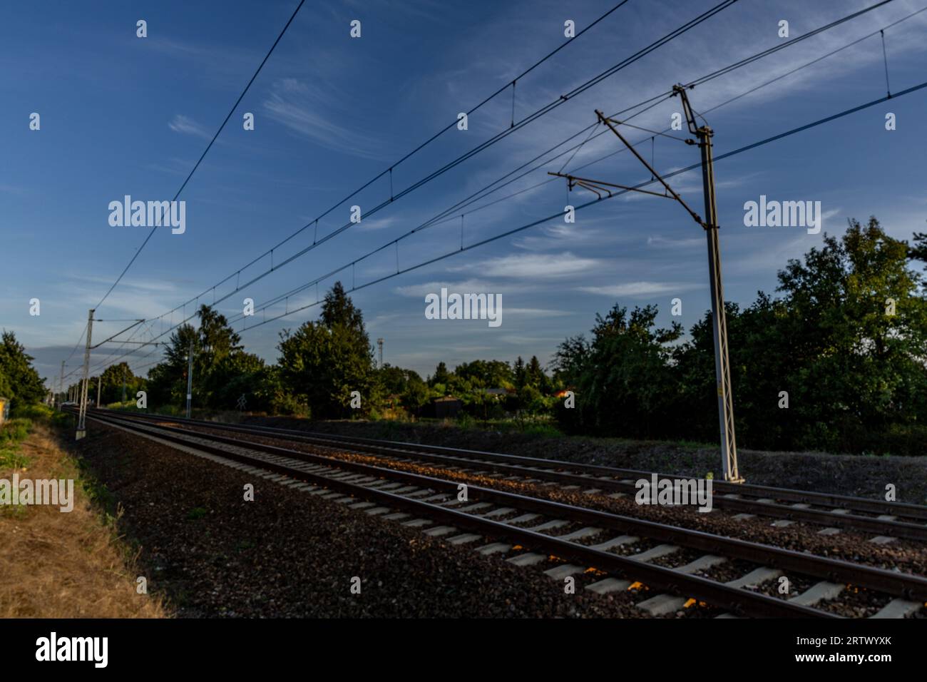 Railway tracks, high voltage traction, pendolino train Stock Photo