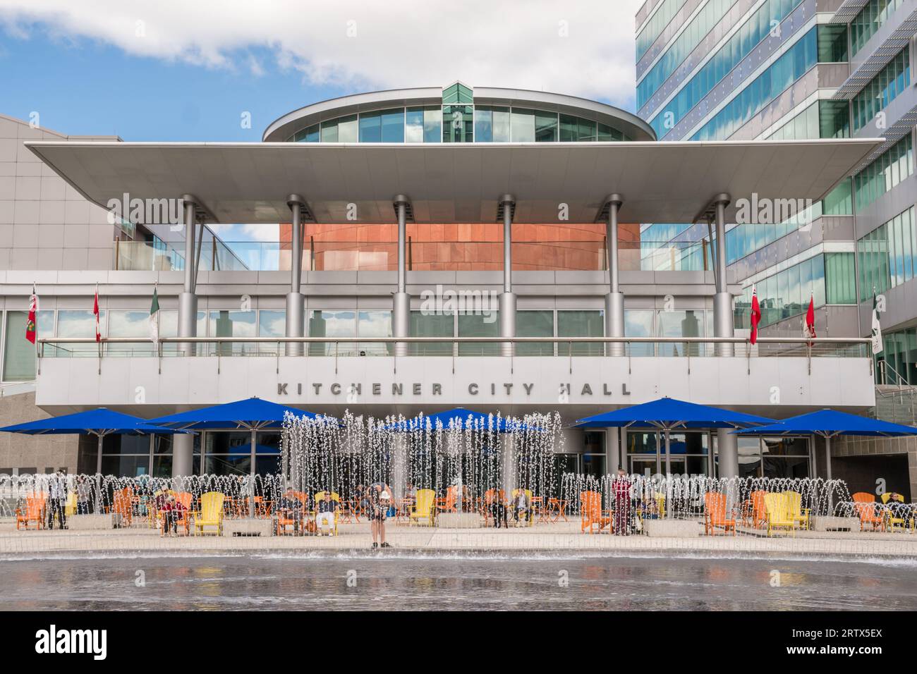 Kitchener, ON, Canada-August 27, 2023: City Hall in downtown district with public fountain. Stock Photo