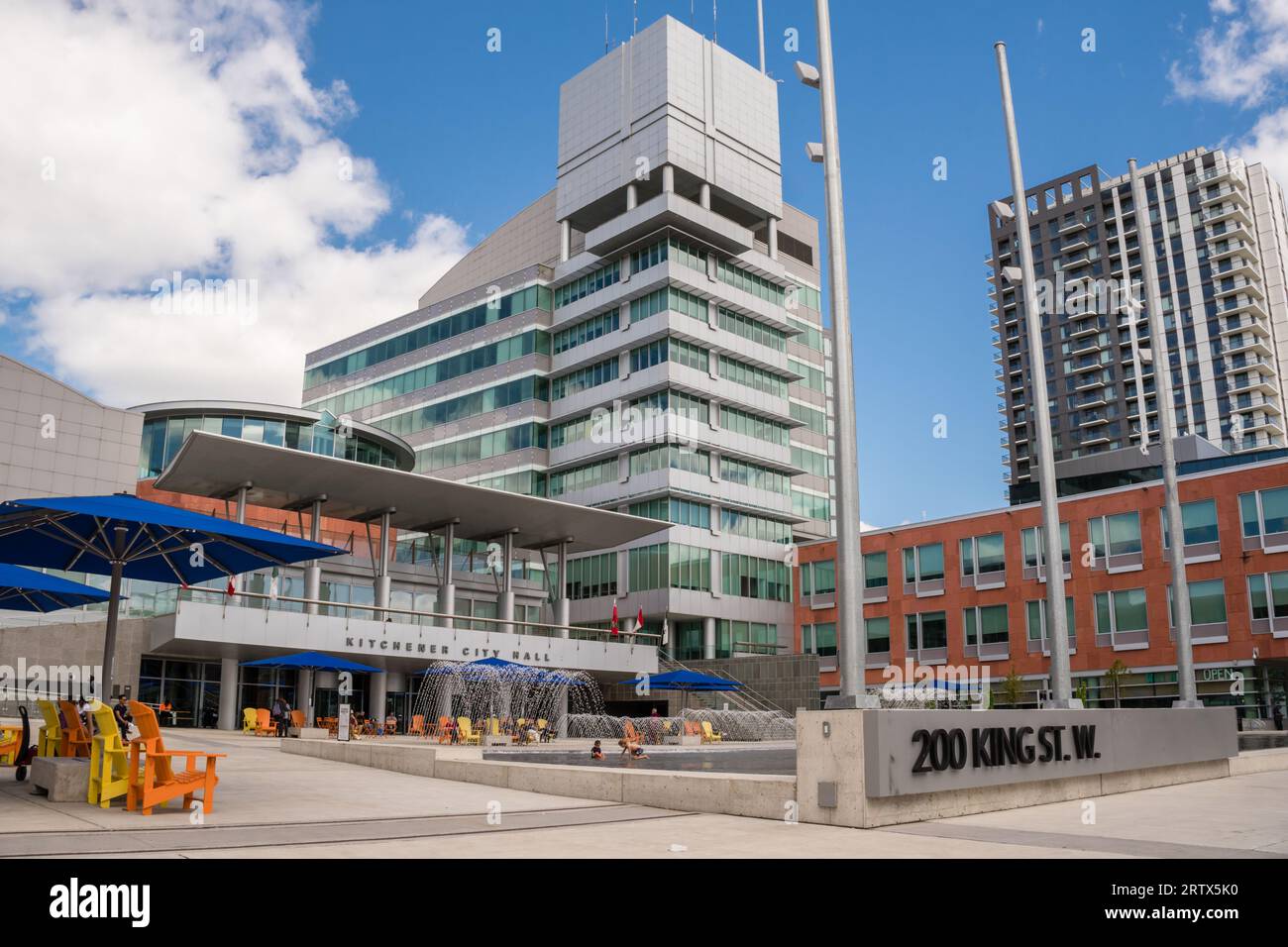 Kitchener, ON, Canada-August 27, 2023: City Hall in downtown district with public fountain. Stock Photo