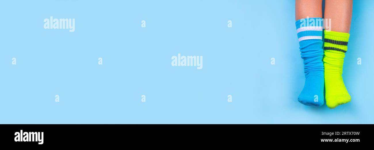 Odd Socks Day, Lonely Sock Day. AntiBullying Week, Down syndrome awareness. Child legs wearing