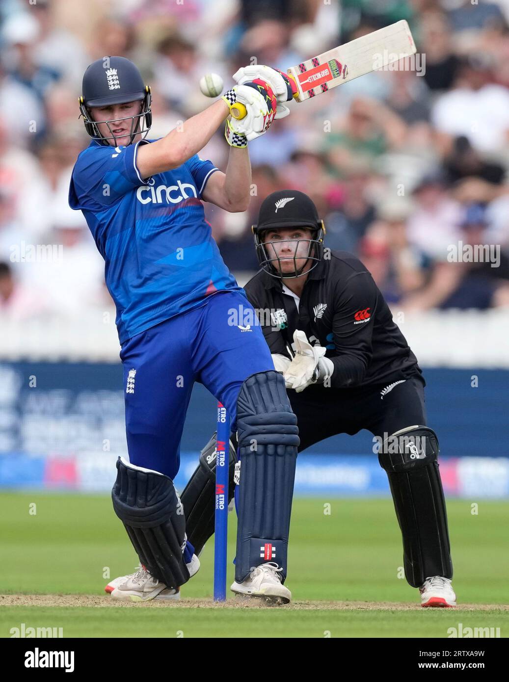 England's Dawid Malan plays a shot off the bowling of New Zealand's