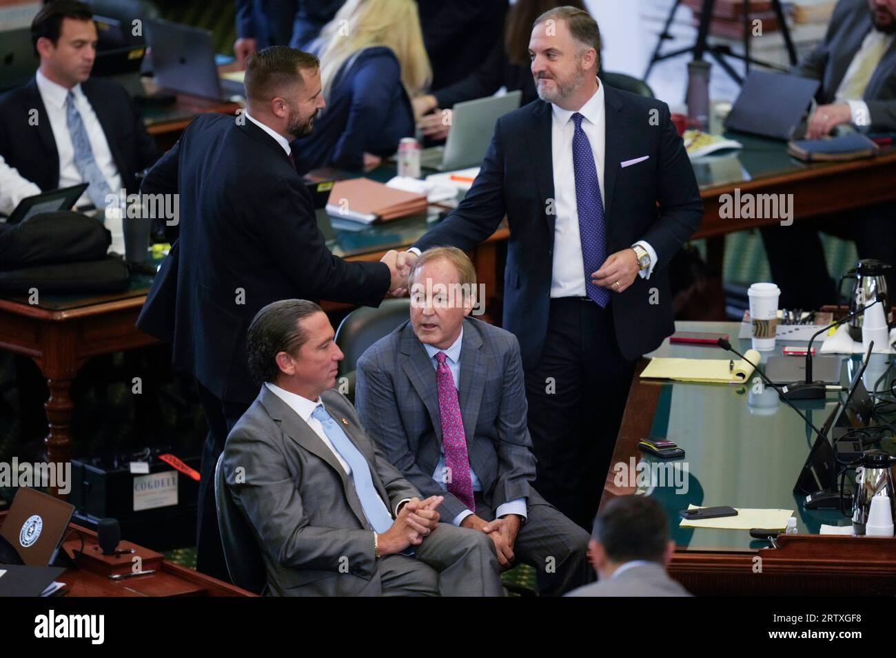 Austin Texas USA, September 15 2023: Suspended Texas attorney general KEN PAXTON(center) sits between defense attorneys TONY BUZBEE (left) and MITCH LITTLE (right) during Paxton's impeachment trial in the Texas Senate. The charges will go to the jury today. Credit: Bob Daemmrich/Alamy Live News Stock Photo