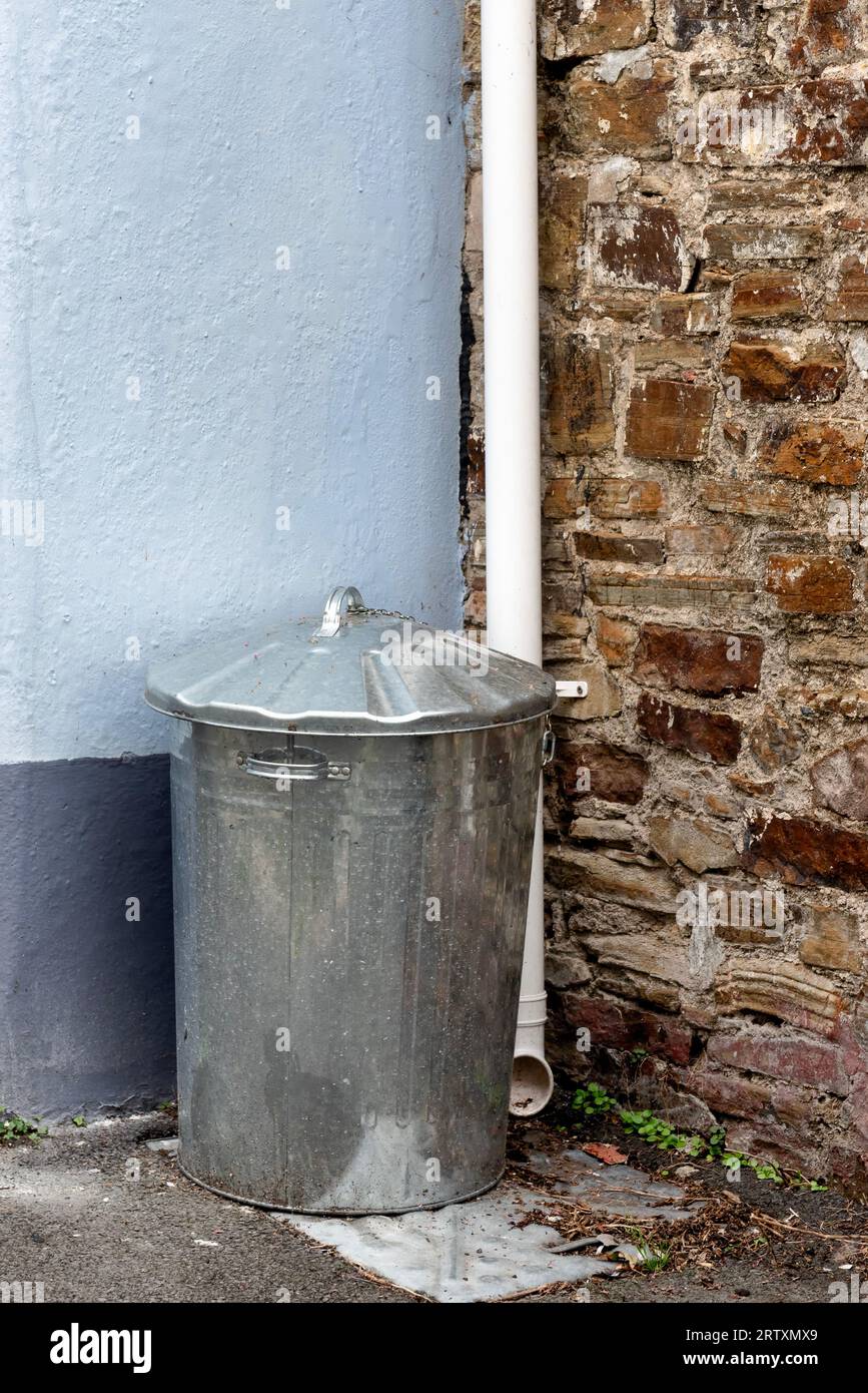 Galvanised steel trash can Stock Photo Alamy