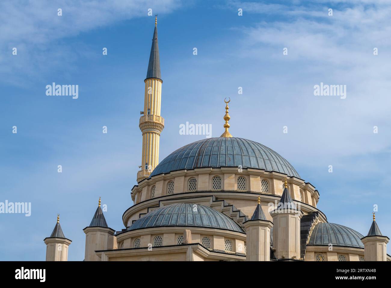 Dome and minaret of the 'Heart of Chechnya' mosque on a sunny day. Grozny, Chechen Republic. Russian Federation Stock Photo