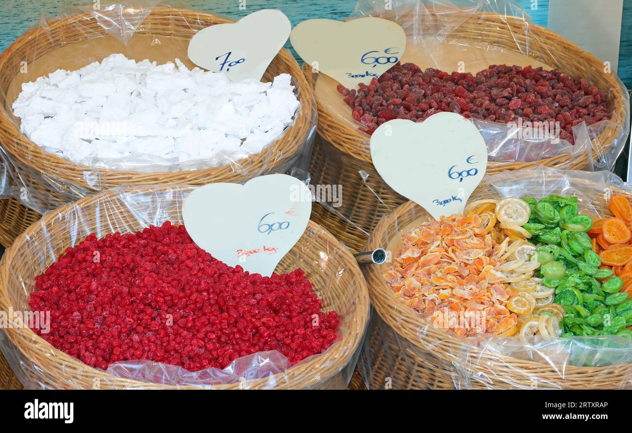 dried fruit baskets with price tags for sale at the local market Stock