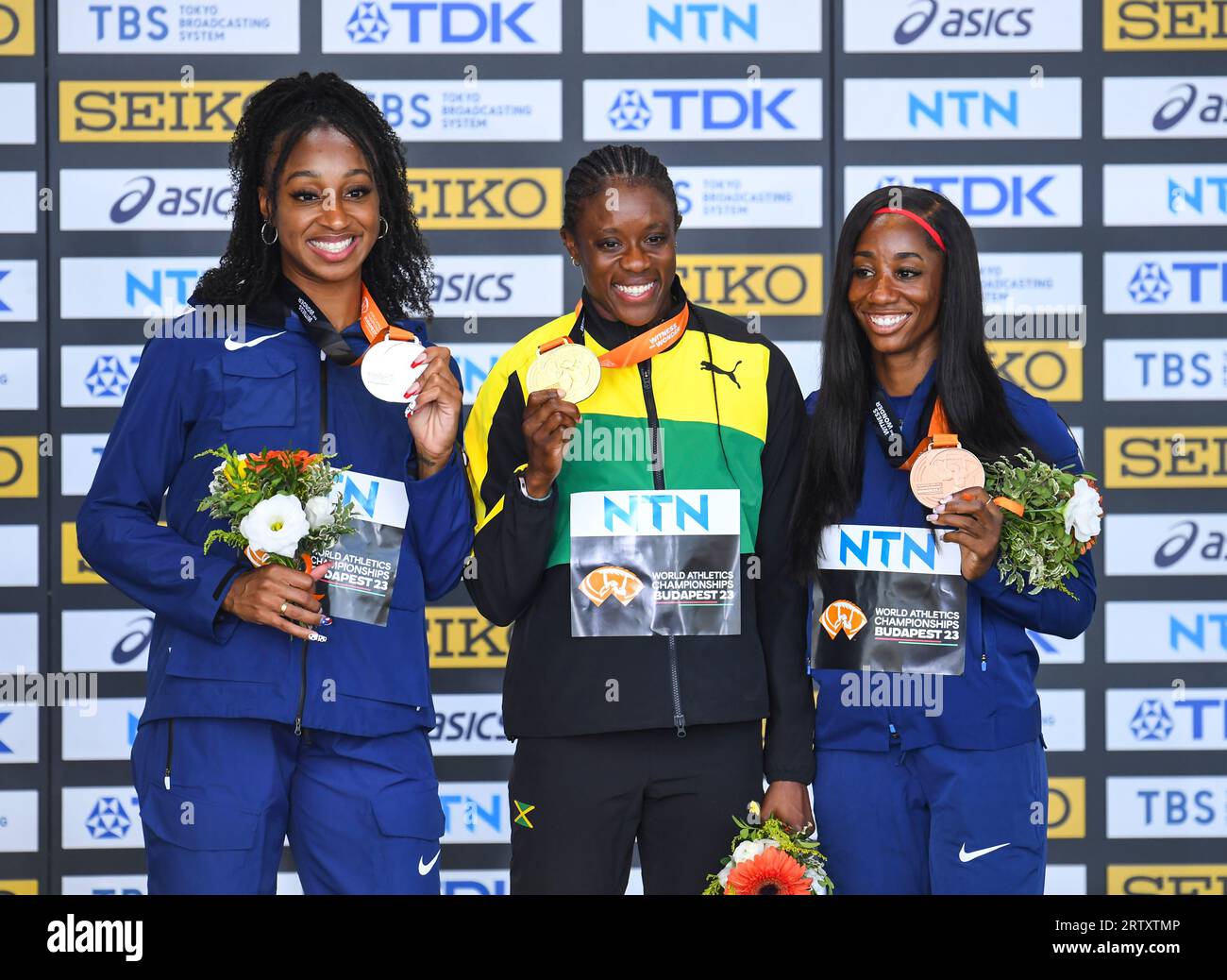 Jasmine Camacho-Quinn of Puerto Rico, Danielle Williams of Jamaica and Kendra Harrison of the USA medal ceremony for 100m hurdles on day seven at the Stock Photo