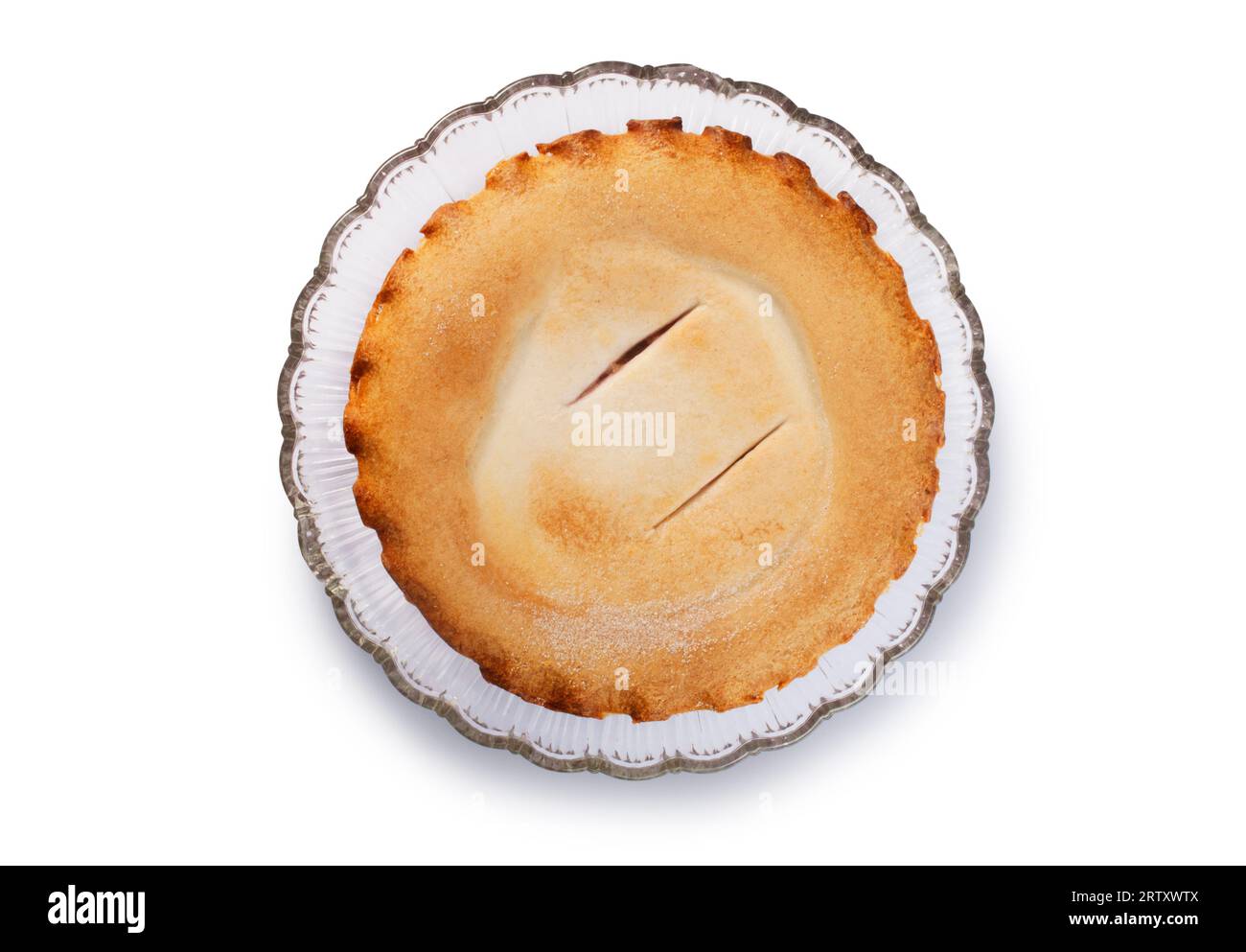 Studio shot of a whole fruit pie resting on a glass plate cut out against a white background - John Gollop Stock Photo