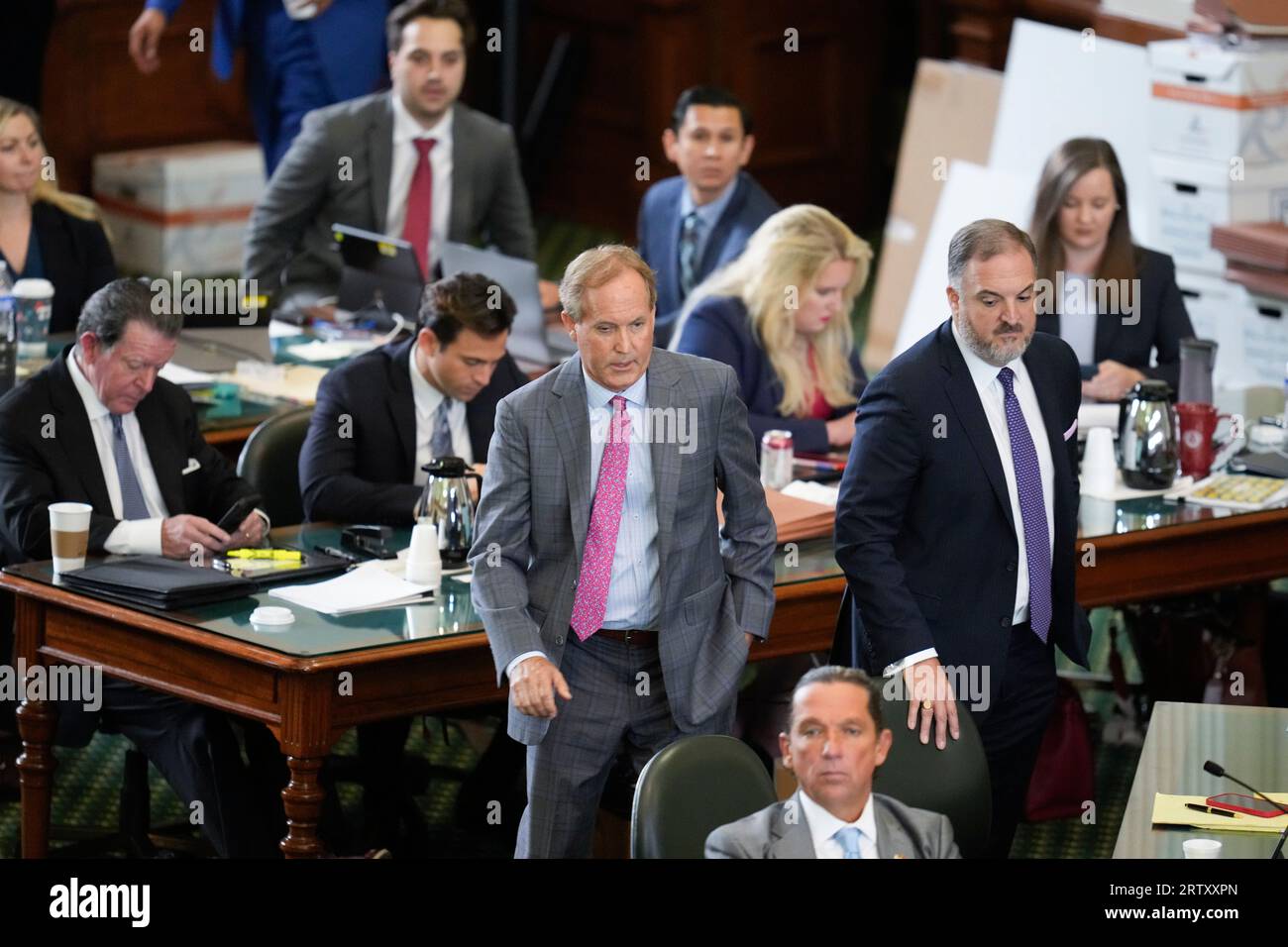 Suspended attorney general KEN PAXTON enters the Senate floor among his attorneys as both sides have rested in Texas Attorney General Ken Paxton's impeachment trial in the Texas Senate on September 15, 2023. THe charges will go to the jury today. Credit: Bob Daemmrich/Alamy Live News Stock Photo